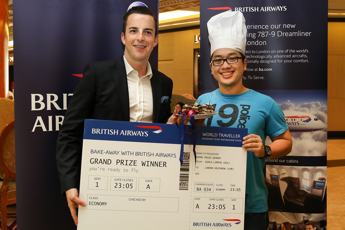 Robert Williams, British Airways’ head of Asia Pacific sale with the grand prize winner, Lye Wei Wern, who wins two return air tickets to London on British Airways.