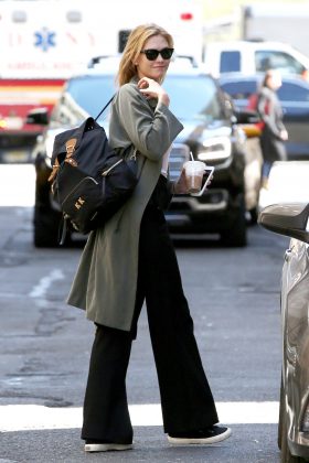 Karlie Kloss carrying Burberry Rucksack - Pamper.My