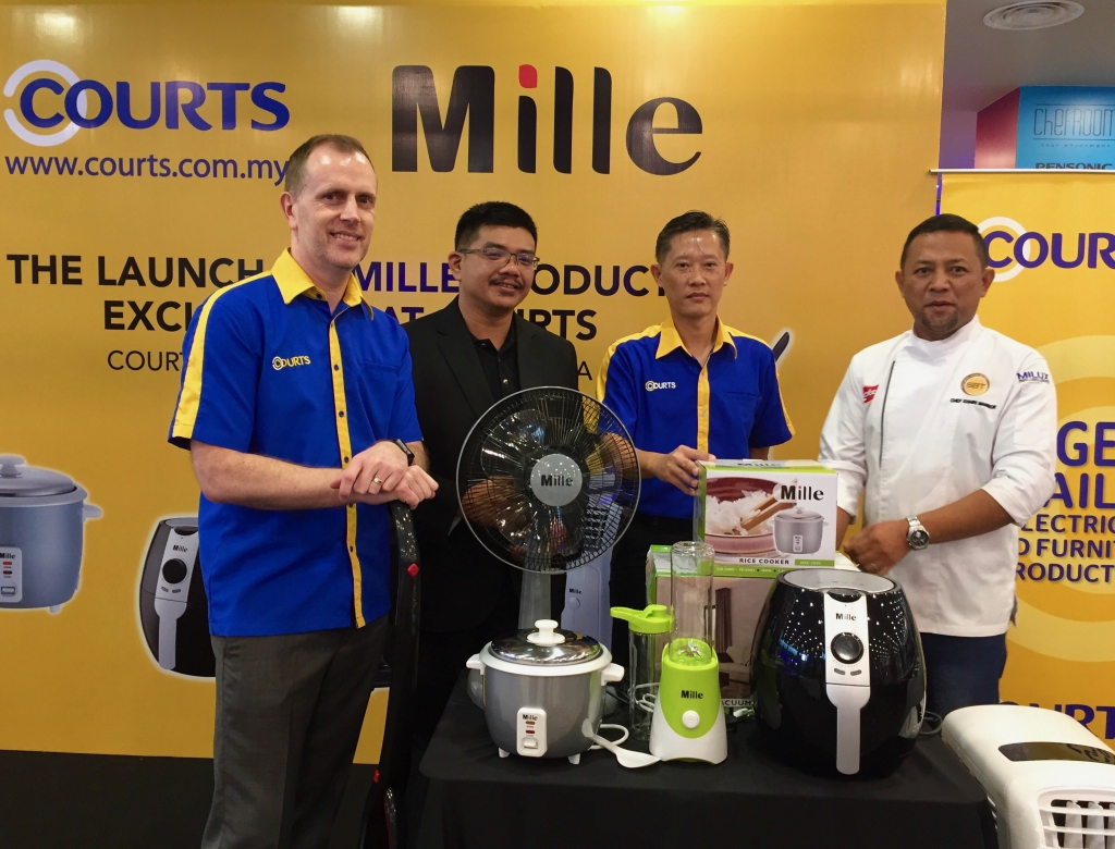 Paul Malcolm - Head of Consumer Electronics, Digital & Household Appliances at COURTS Malaysia (1st from left), Ben Tan - Executive Director at MILUX Corporation Berhad (2nd from left), Simon Ng - Commercial Director at COURTS Malaysia (2nd from right) and Chef Khairi Mansor - MILUX Corporation Berhad (1st from right) unveiling Mille range of lifestyle products exclusively at COURTS Malaysia.