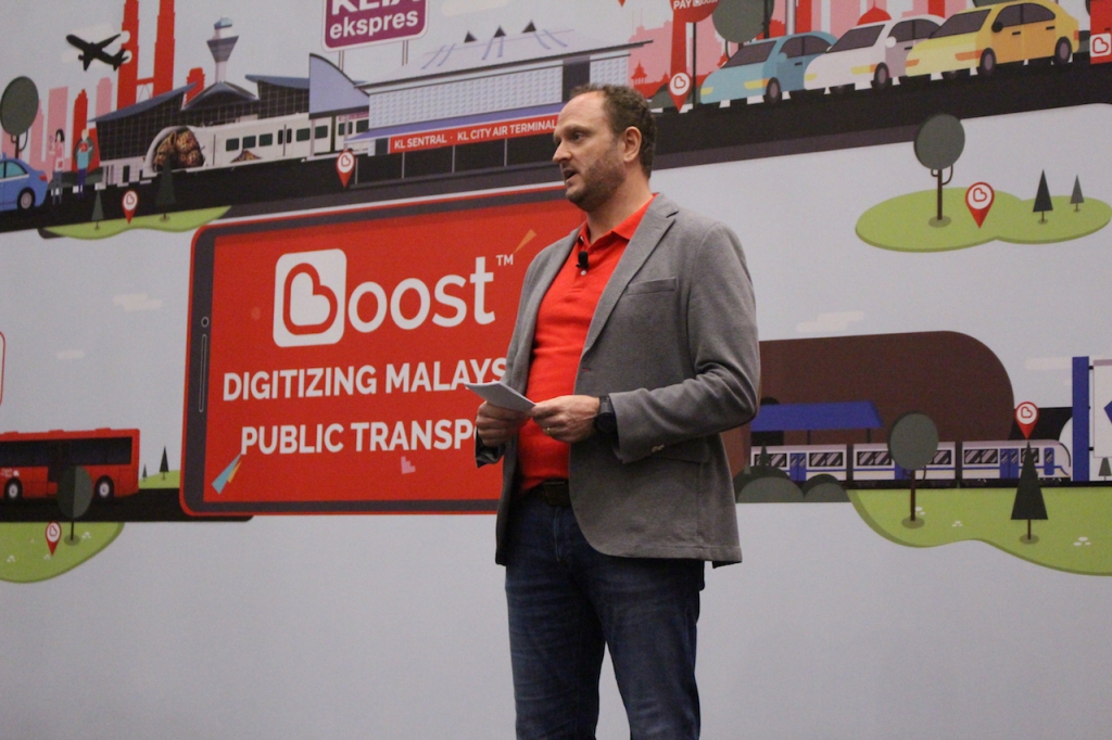 Mr Christopher Tiffin, CEO of Boost giving his introductory speech