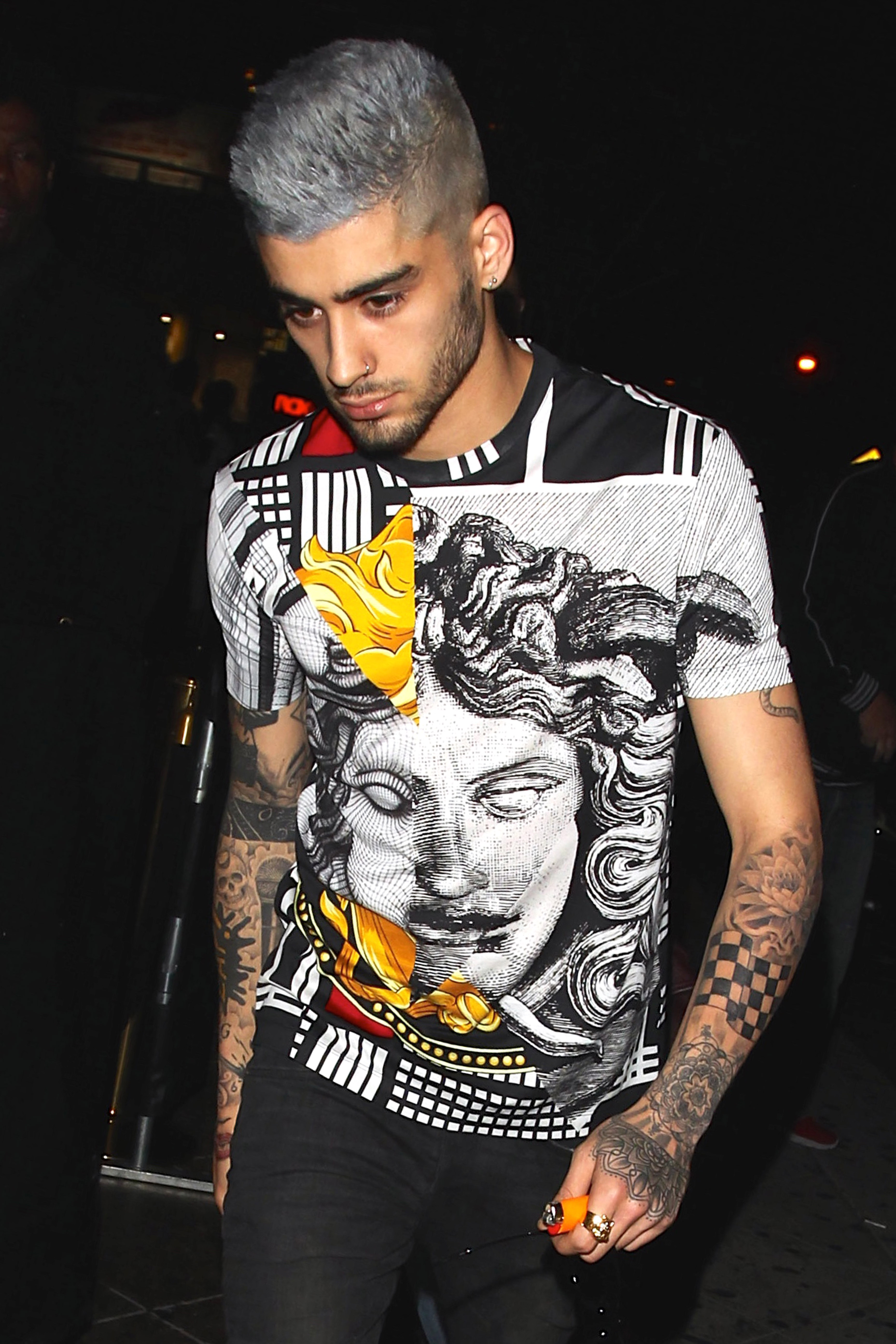 Zayn Malik debuts his new grey hairdo at 1OAK Nightclub