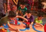 Children entering a world of story-telling and play with Thomas and Friends