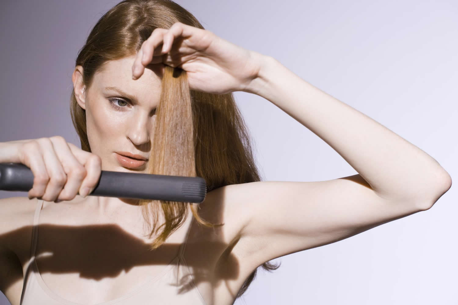Using a straightener on sale