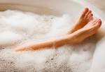 getty_rf_photo_of_woman_relaxing_in_bath