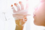 getty_rf_photo_of_woman_drinking_water