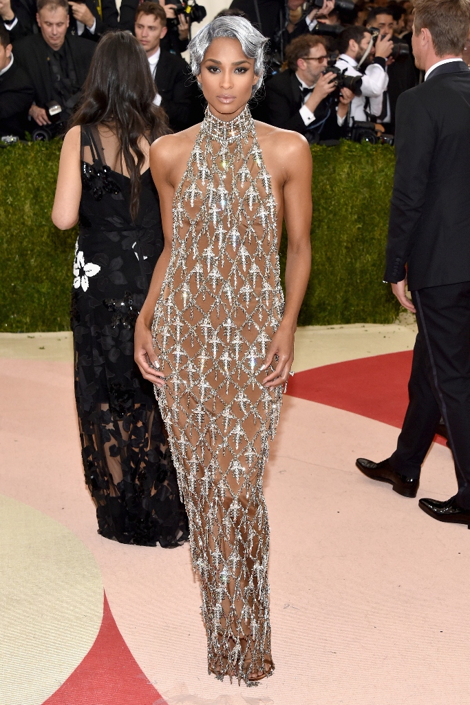 Singer Ciara’s intricate and daring dress has been hand-made as if by a jeweller. Pendants of Swarovski crystals hang from a diamond grid of leaf-like metal chain, with a choker neck and sporty racer back.