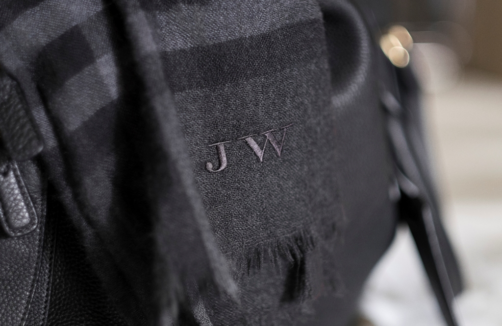 The Lightweight Cashmere Scarf in check is made at a Scottish mill established in 1866. Crafted from hand-combed super-fine fibres, the fabric is washed in local spring water and then pressed and lightly steamed for a soft, lustrous finish.