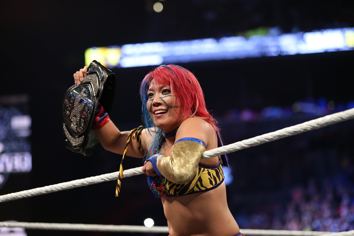 Asuka with NXT Women's Title.
