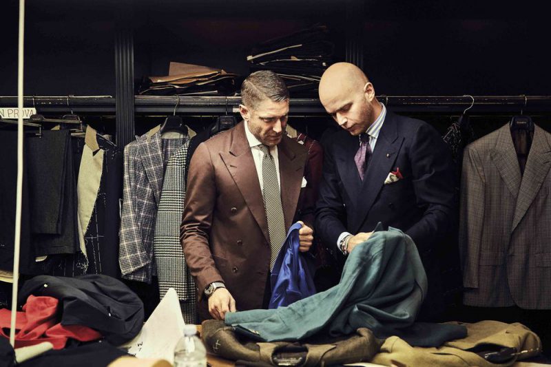 Elkann (left) and Luca Rubinacci inspect the threads.