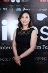 MIFFEST and MGGA chairman Joanne Goh wearing the Rendez-Vous Moon