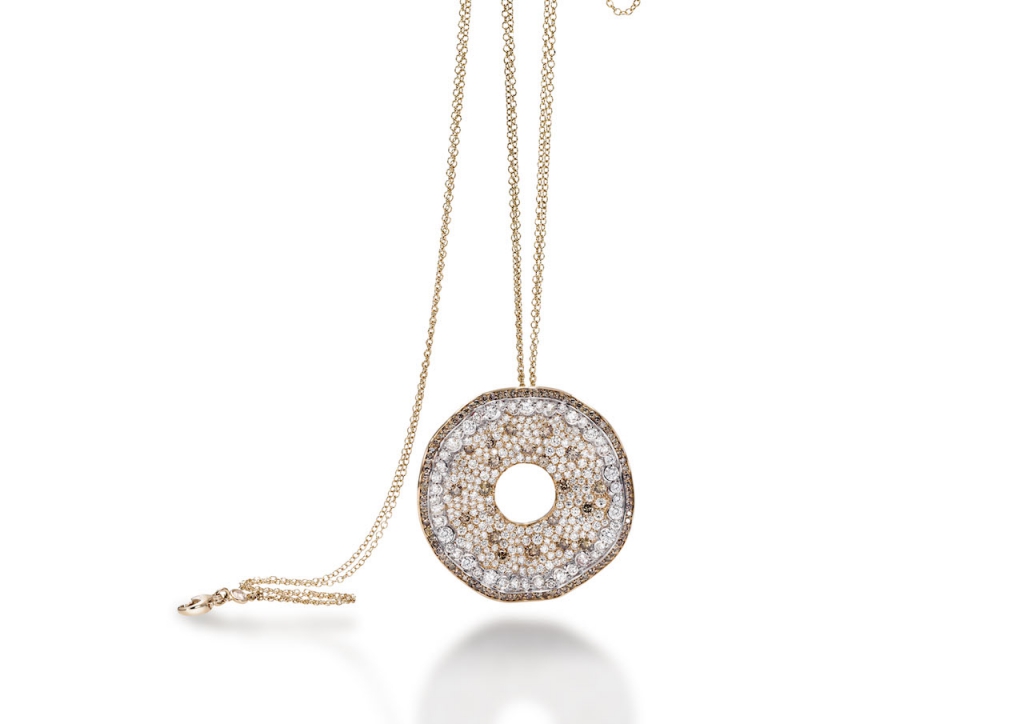 Timeless femininity and a touch of whimsy are brought together in this 18K rose gold piece, featuring a rose window pendant sparkling with diamonds in champagne and white hues.