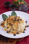 Eight treasure fried rice on lotus leaf