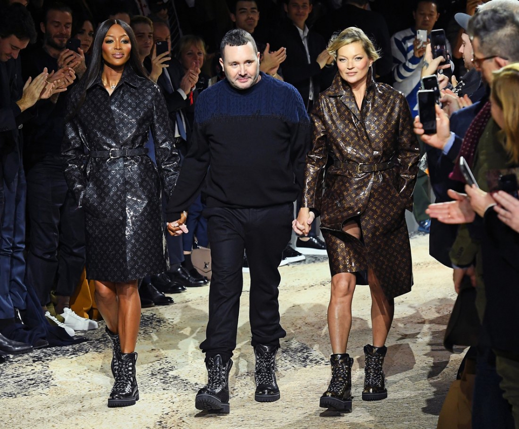 PARIS, FRANCE - JANUARY 18: Designer Kim Jones (center) walks the runway with Naomi Campbell and Kate Moss during the Louis Vuitton Menswear Fall/Winter 2018-2019 show finale as part of Paris Fashion Week on January 18, 2018 in Paris, France. (Photo by Dominique Charriau/WireImage)