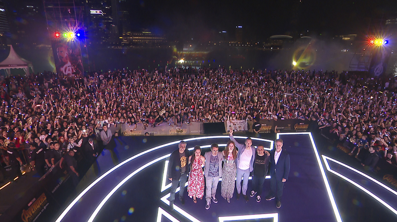 Fans in the Expo Hall and the cast members (from left) Mahesh Samat, Trinh Tran, Robert Downey Jr, Karen Gillan, Benedict Cumberbatch, Joe Russo and George Tanasijevich at the Event Plaza