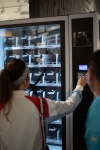 Participant receiving a surprise gift from PUMA’s vending machine