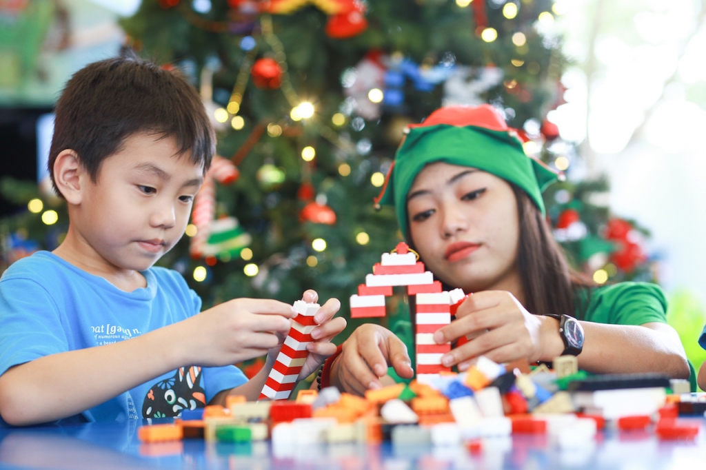 LEGOLAND Malaysia Elves assisting children on their LEGO building activities