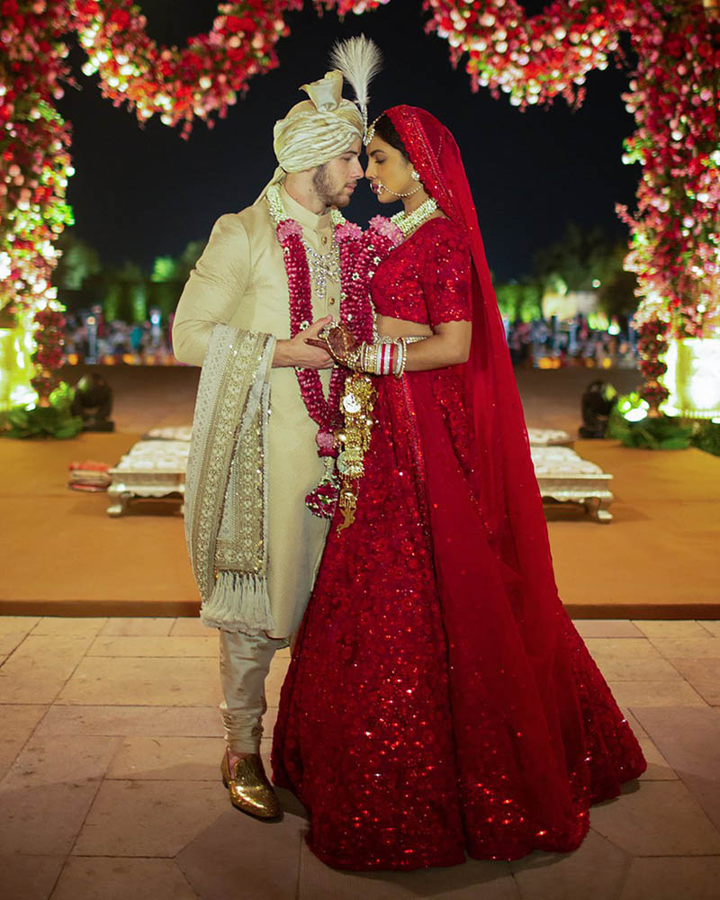 Priyanka Chopra and Nick Jonas pose for a portrait after getting married in Hindu tradition. Courtesy: Priyanka/twitter