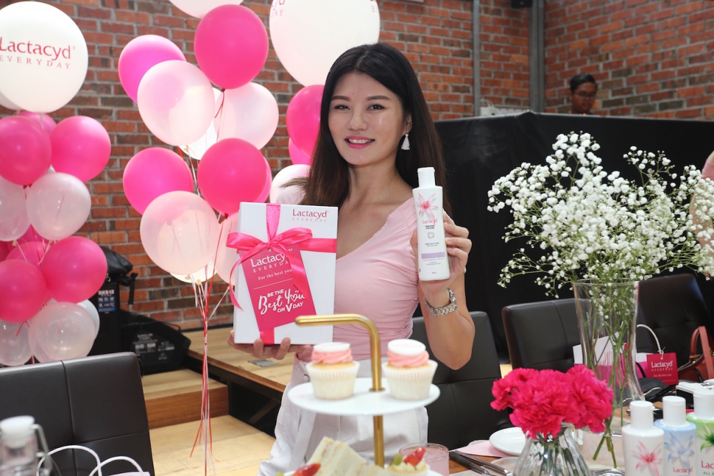Lifestyle blogger, Rane Chin posing with one of Lactacyd’s best-selling products, Feminine Hygiene which gives your V natural care and protection for extra-care days (menstruation) with a balanced pH level.