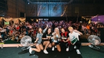 Hyolyn posing for a mega selfie with her fans